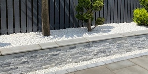 Отделка камнем подпорных стен и забора с применением 3D панели RKS SLATE Мрамор Cloudy Grey фото результата (6)
